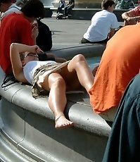 Blonde babe has nice tattoo and, of course, sexy upskirt